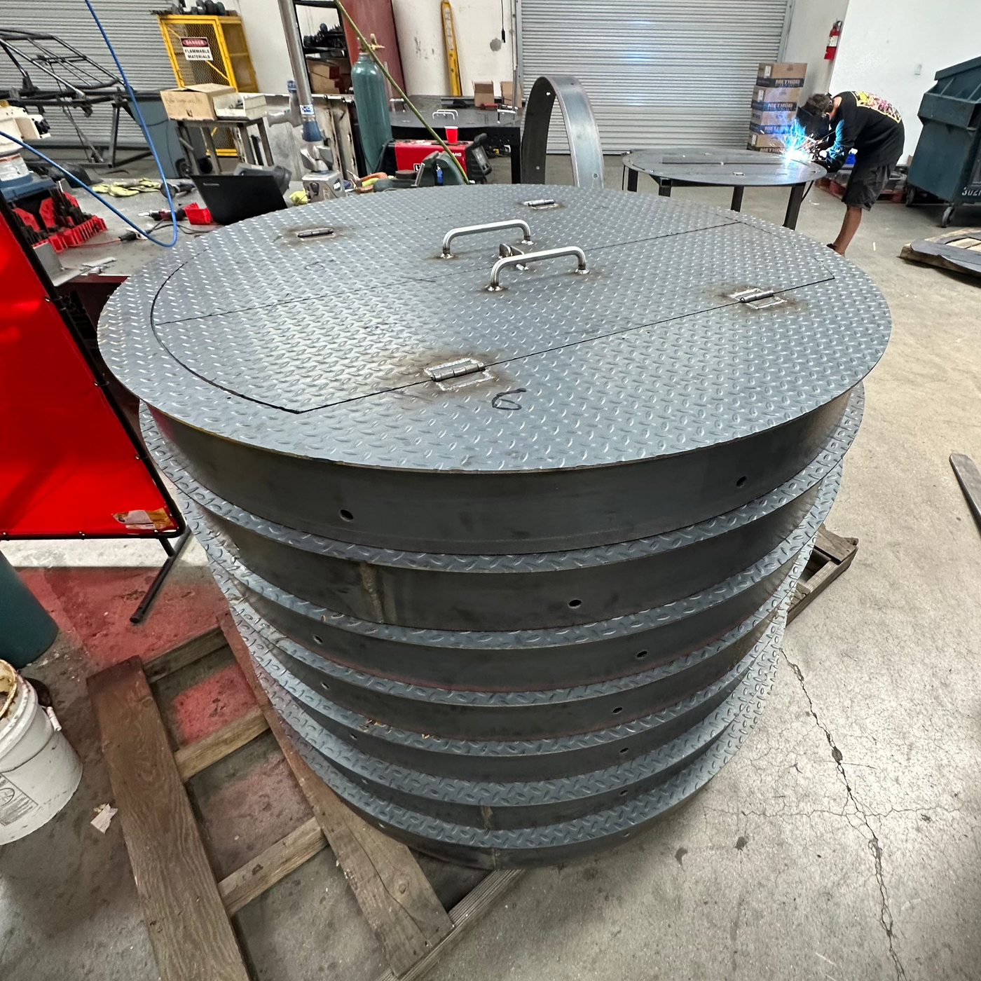 Manhole covers with doors